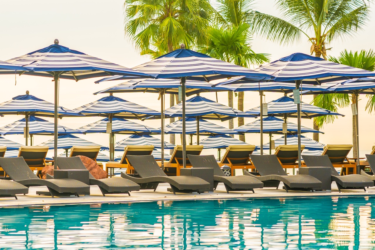 Caribbean airlines flights beach pool umbrella hotel resort